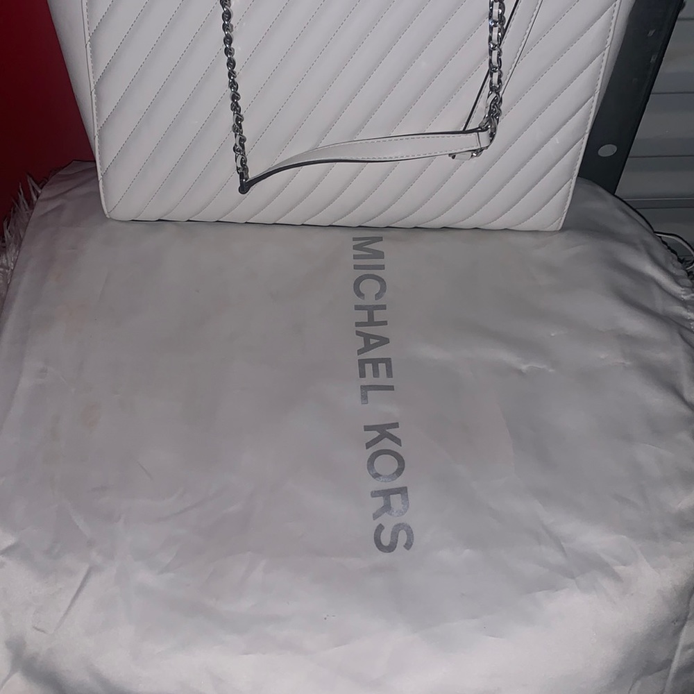 Michael Kors pocket book and wallet